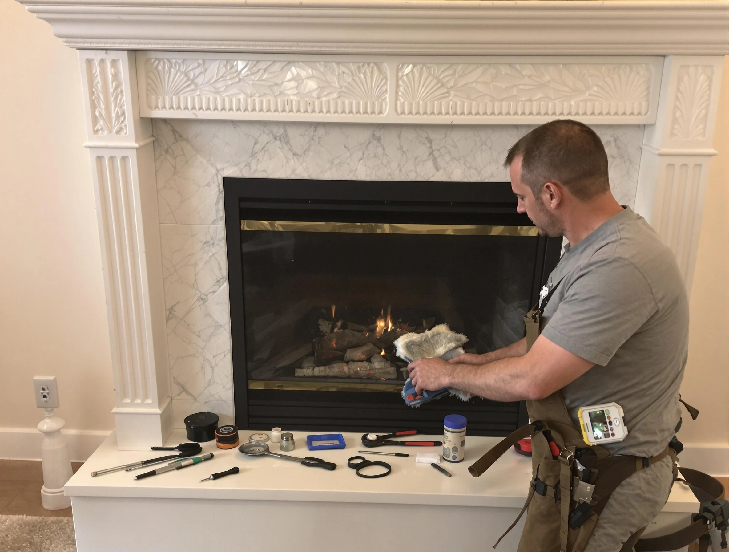 Acworth Chimney Sweep performing fireplace maintenance in Acworth, GA
